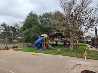 view of jungle gym featuring a yard