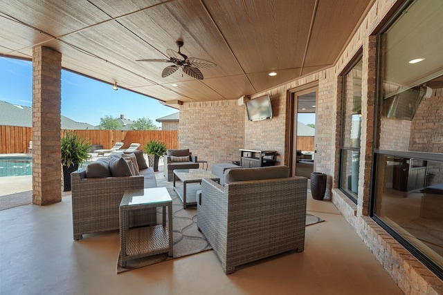 view of patio / terrace featuring an outdoor living space and ceiling fan