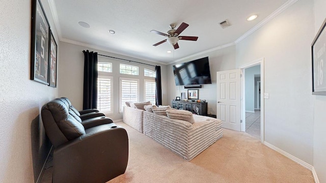 carpeted living room featuring crown molding and ceiling fan