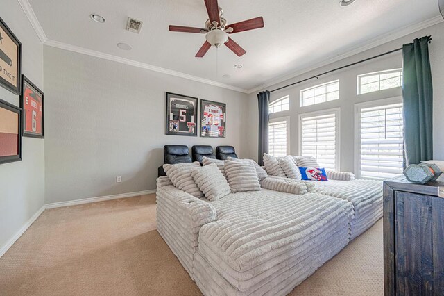 bedroom featuring ceiling fan, light colored carpet, and crown molding