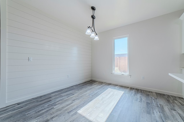 1708 E Main St, Brownfield, TX 79316 - unfurnished room featuring wood finished floors and baseboards