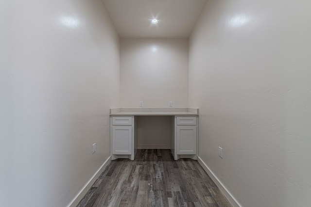 1708 E Main St, Brownfield, TX 79316 - unfurnished office with dark wood finished floors and baseboards