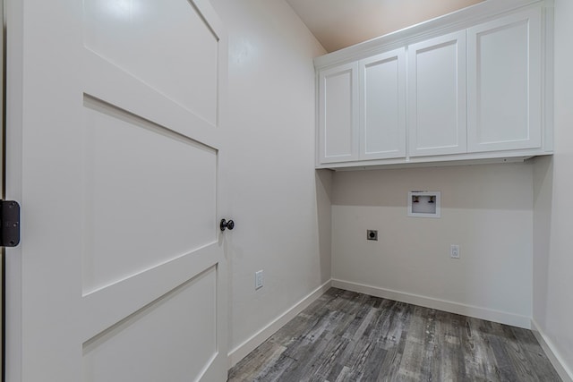 1708 E Main St, Brownfield, TX 79316 - washroom featuring electric dryer hookup, cabinet space, wood finished floors, washer hookup, and baseboards