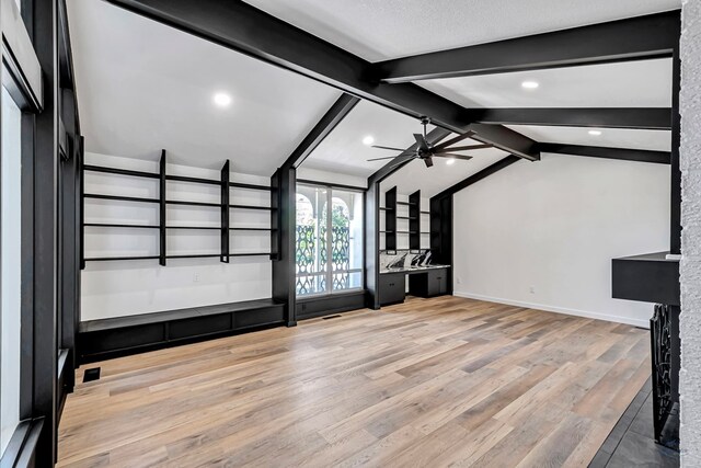 905 Mountain Park Dr, Big Spring, TX 79720 - unfurnished living room featuring ceiling fan, wood finished floors, baseboards, and recessed lighting
