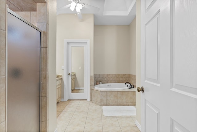 bathroom featuring tile patterned flooring, vanity, independent shower and bath, and ceiling fan