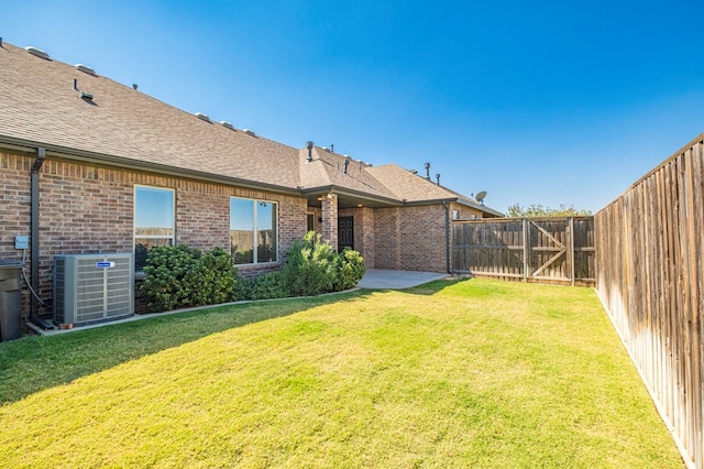 1221 Porterfield Rd, Midland, TX 79705 - view of yard featuring central AC