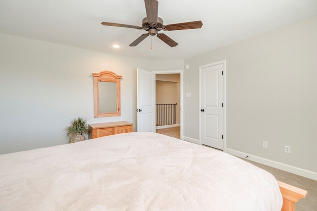 1221 Porterfield Rd, Midland, TX 79705 - bedroom featuring baseboards, light colored carpet, recessed lighting, and ceiling fan