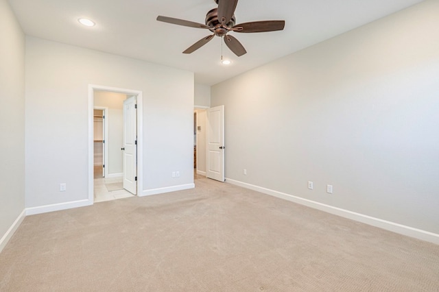 1221 Porterfield Rd, Midland, TX 79705 - unfurnished bedroom featuring light carpet, recessed lighting, baseboards, ensuite bath, and a ceiling fan