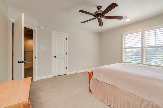 1221 Porterfield Rd, Midland, TX 79705 - bedroom with multiple windows, carpet floors, baseboards, recessed lighting, and a ceiling fan