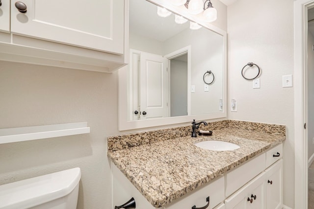 1221 Porterfield Rd, Midland, TX 79705 - bathroom featuring vanity and toilet