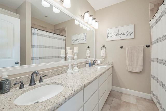 bathroom with vanity, walk in shower, and tile patterned floors