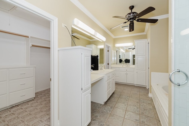 interior space featuring a bathing tub, vanity, ceiling fan, and crown molding