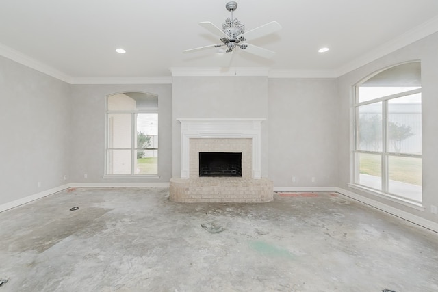 unfurnished living room featuring a fireplace, ceiling fan, and ornamental molding