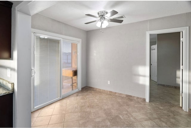 interior space featuring ceiling fan