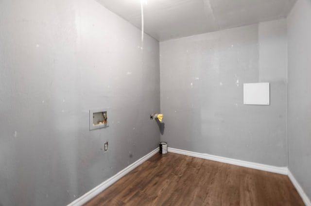 laundry room featuring washer hookup and dark wood-type flooring