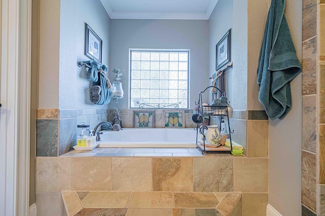 bathroom with a relaxing tiled tub and crown molding