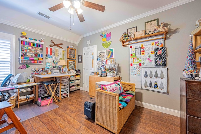 interior space featuring hardwood / wood-style flooring, ceiling fan, and ornamental molding