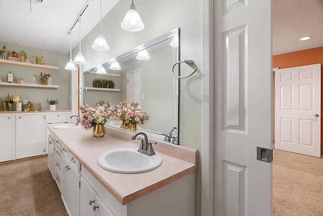 4 Glenwick Cv, Big Spring, TX 79720 - bathroom featuring double vanity and a sink