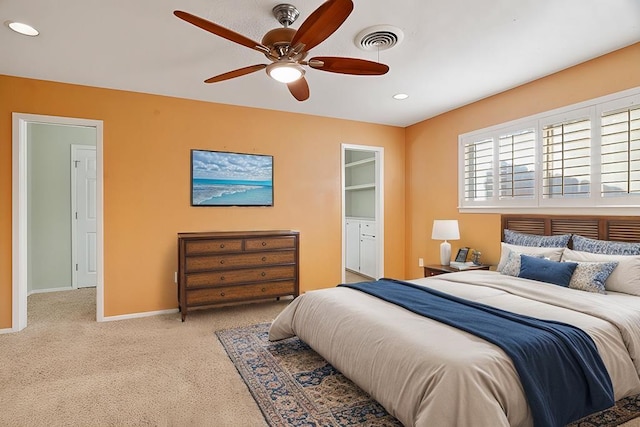 carpeted bedroom with ceiling fan