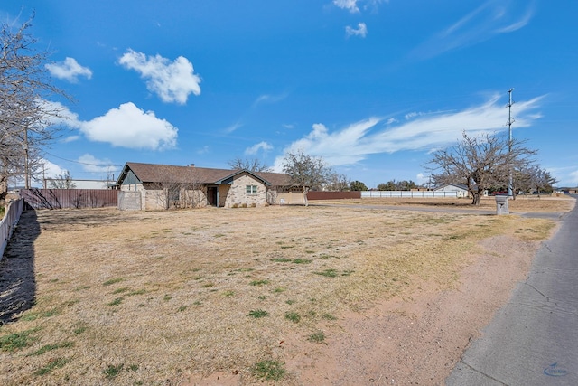 view of yard with fence