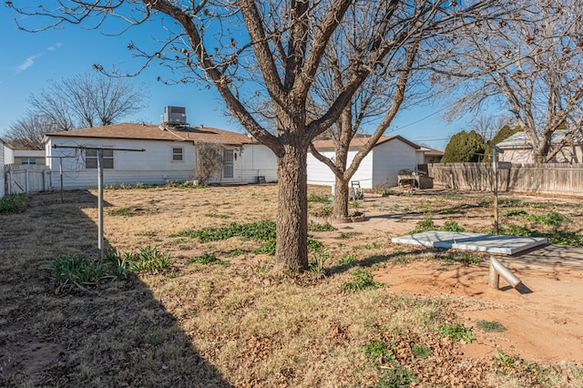 view of yard with central AC