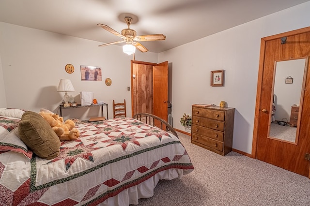 bedroom with ceiling fan and carpet flooring