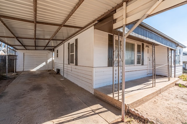 view of home's exterior featuring a carport