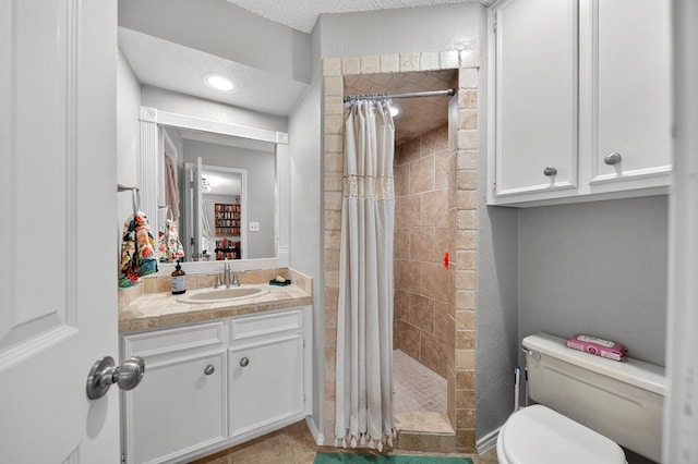 4502 Green Tree Blvd, Midland, TX 79707 - bathroom with vanity and a tile shower