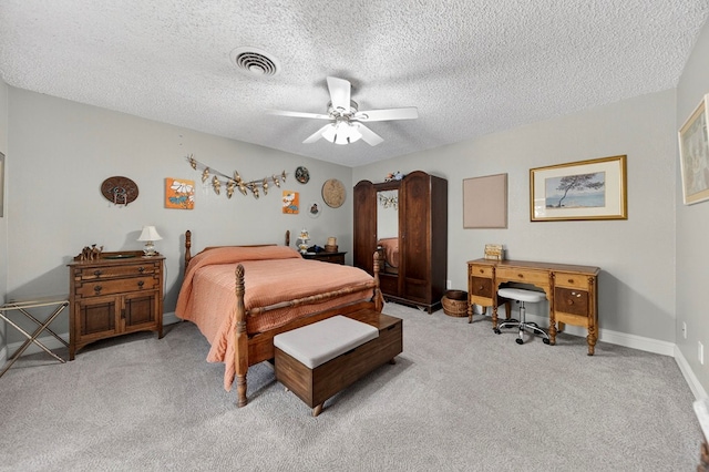 4502 Green Tree Blvd, Midland, TX 79707 - bedroom featuring light colored carpet, a textured ceiling, and ceiling fan