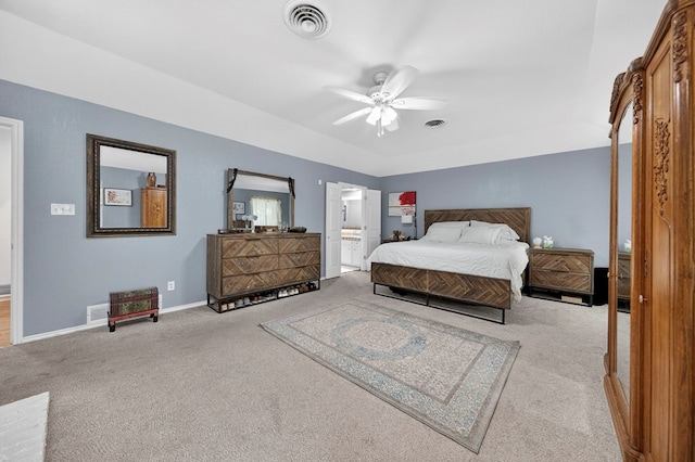 4502 Green Tree Blvd, Midland, TX 79707 - bedroom with carpet flooring, ensuite bathroom, and a ceiling fan