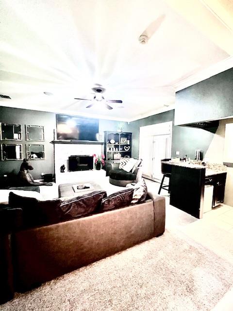 living room with ceiling fan