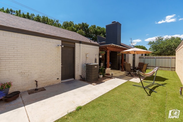 4313 Downing Ave, Midland, TX 79707 - view of yard featuring a patio area and central AC