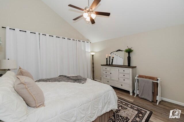 4313 Downing Ave, Midland, TX 79707 - bedroom featuring wood finished floors, baseboards, ceiling fan, and high vaulted ceiling