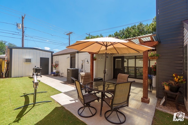 4313 Downing Ave, Midland, TX 79707 - view of patio featuring outdoor dining space and central AC