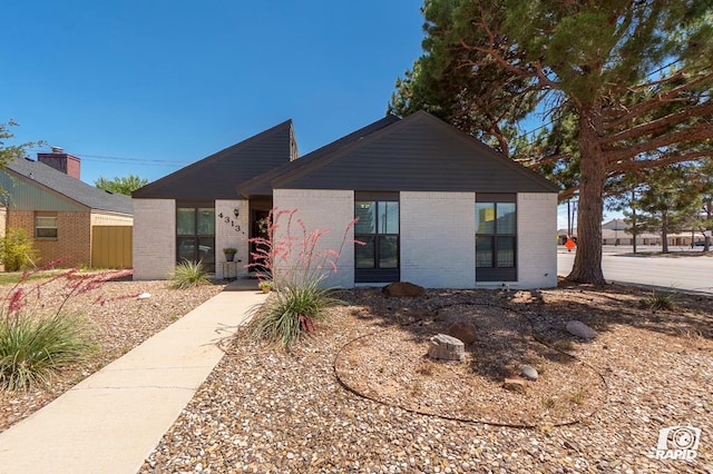 4313 Downing Ave, Midland, TX 79707 - view of front facade featuring brick siding