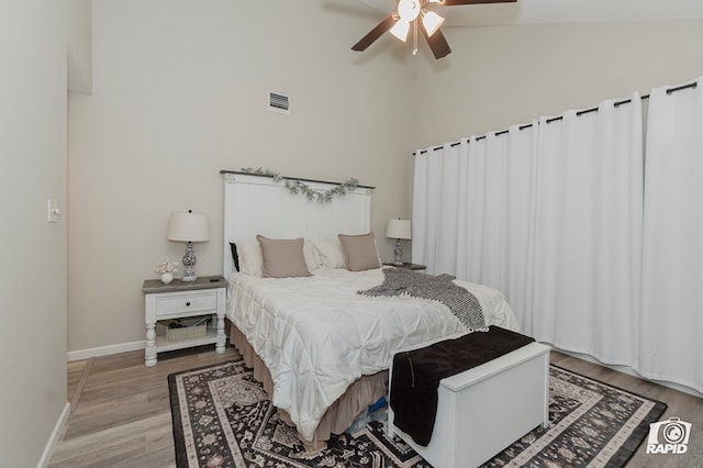 4313 Downing Ave, Midland, TX 79707 - bedroom featuring light wood-style flooring, baseboards, ceiling fan, and high vaulted ceiling