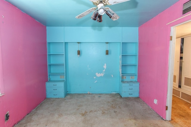 unfurnished bedroom with ceiling fan and light carpet