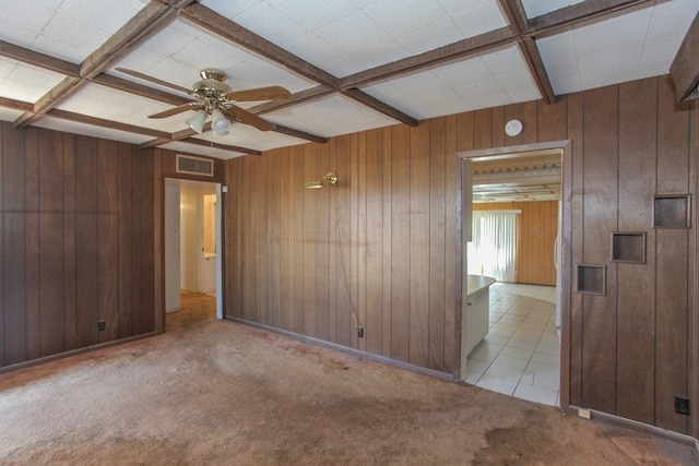 spare room with beam ceiling and coffered ceiling