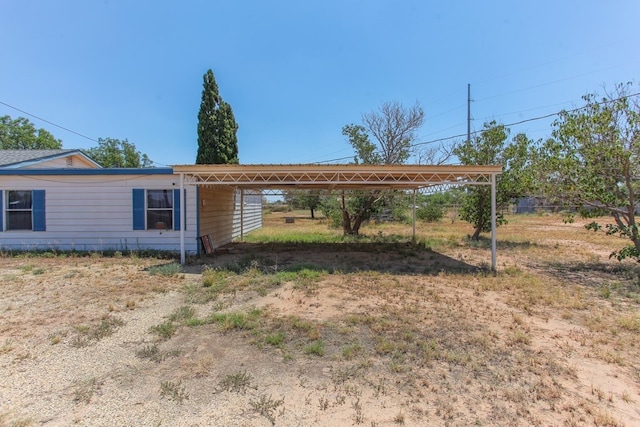 view of yard featuring a carport