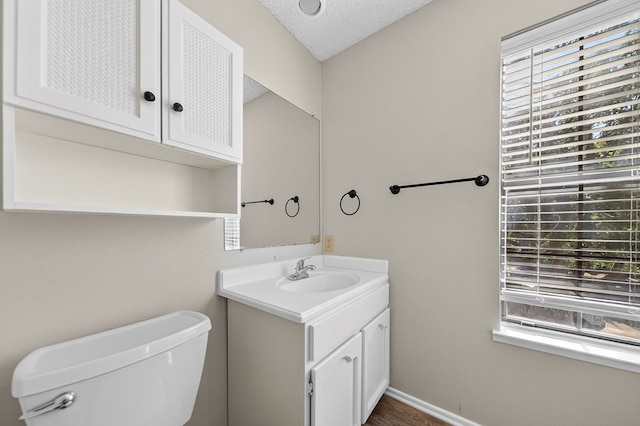 3208 Preston Dr, Midland, TX 79707 - bathroom with vanity and a textured ceiling