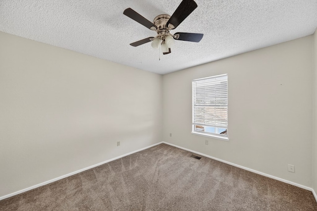 3208 Preston Dr, Midland, TX 79707 - unfurnished room featuring a textured ceiling, carpet flooring, and a ceiling fan