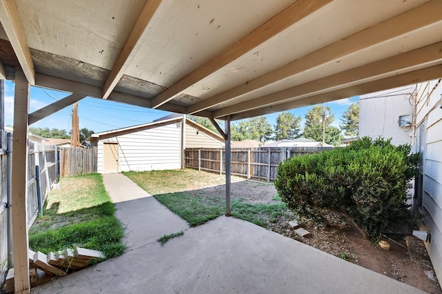 3208 Preston Dr, Midland, TX 79707 - fenced backyard featuring a patio area and a storage unit