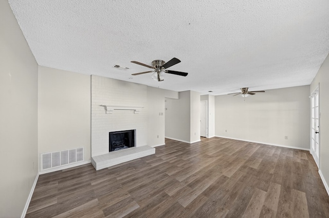 3208 Preston Dr, Midland, TX 79707 - unfurnished living room with a ceiling fan, a textured ceiling, and wood finished floors