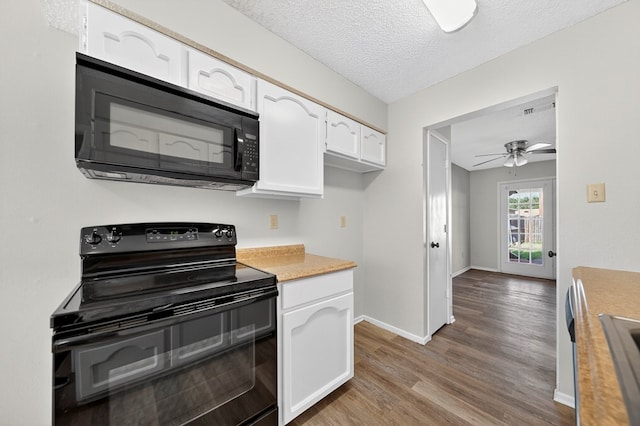 3208 Preston Dr, Midland, TX 79707 - kitchen featuring black appliances, white cabinetry, light wood-style floors, light countertops, and ceiling fan