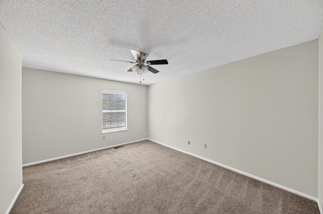 3208 Preston Dr, Midland, TX 79707 - carpeted spare room featuring a ceiling fan and a textured ceiling