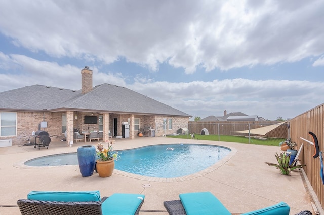 7209 E County Rd 96, Midland, TX 79706 - view of pool with a fenced backyard and a patio