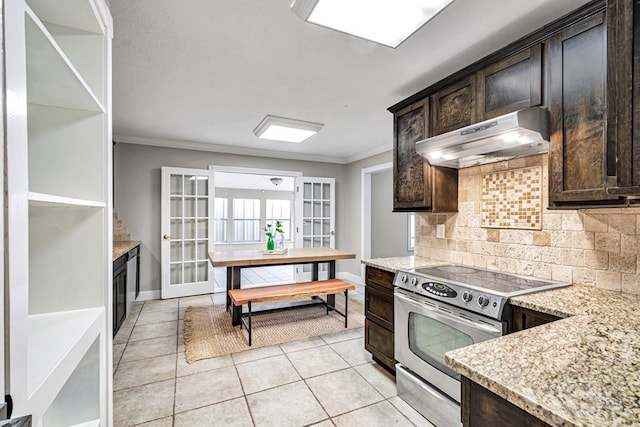 kitchen featuring crown molding, electric range, dark brown cabinetry, and under cabinet range hood