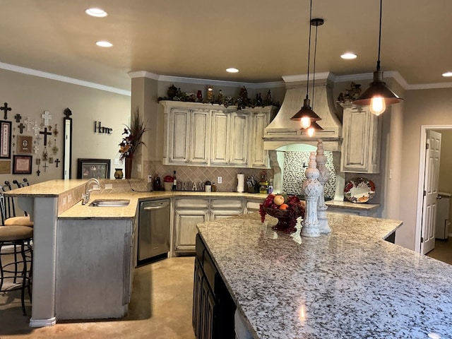 kitchen featuring a kitchen bar, sink, hanging light fixtures, stainless steel dishwasher, and light stone counters