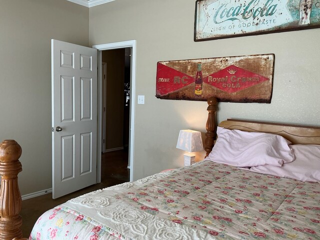 bedroom featuring crown molding