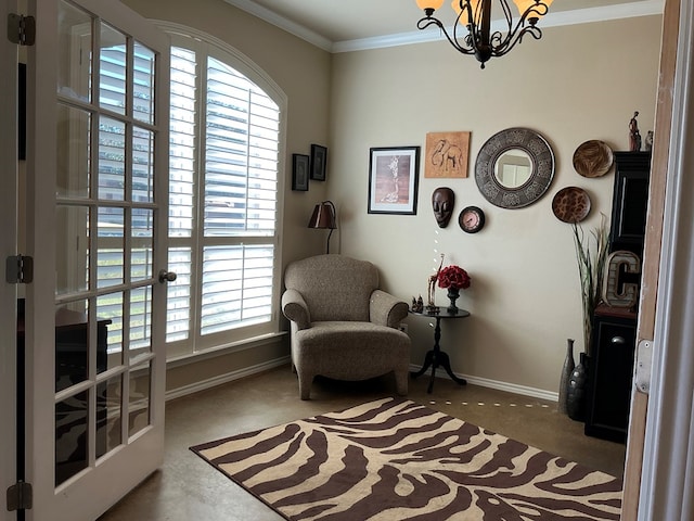 living area with a notable chandelier, carpet floors, and crown molding